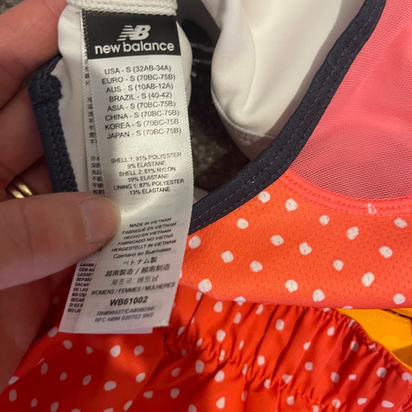 New Balance | Orange Polka Dot Sports Bra and Shorts Set - Picture 3 of 4